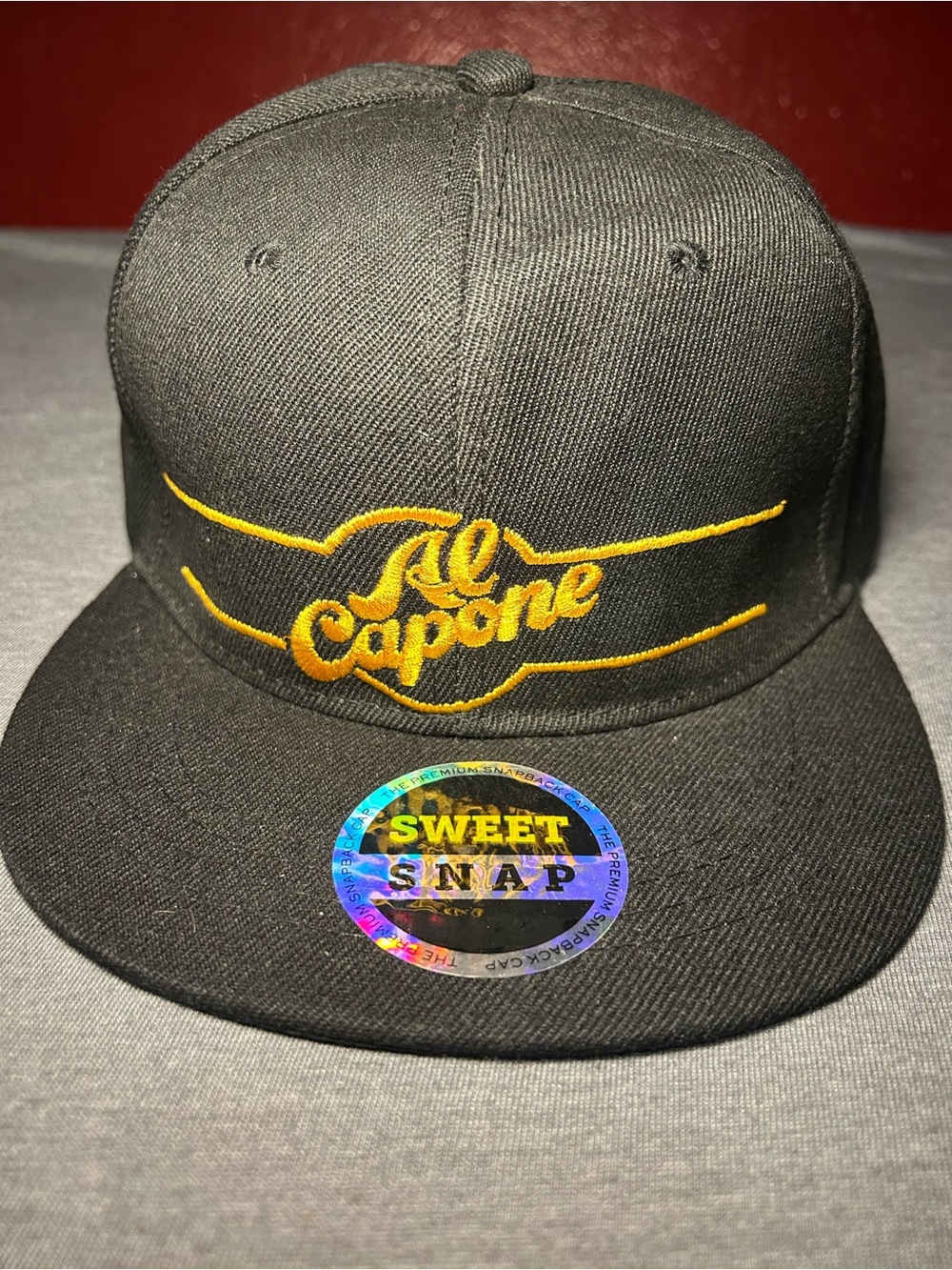 Black Snapback Hat with Gold Embroidery